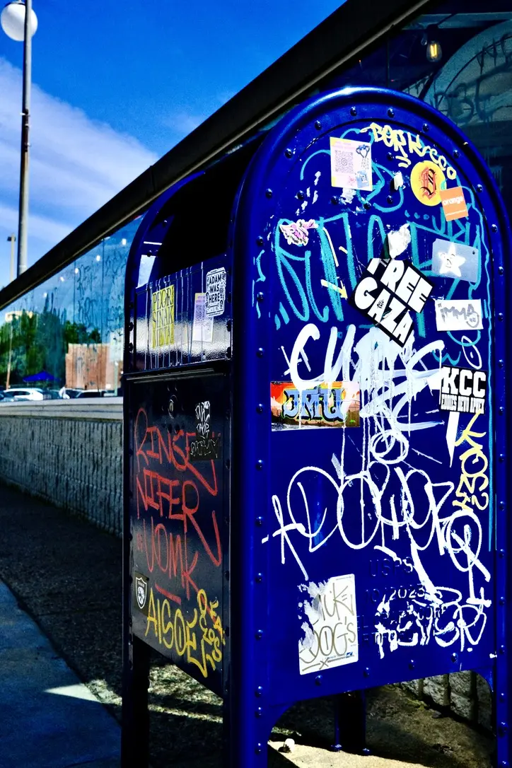 A USPS mailbox, covered in graffiti, spotted in Los Angeles.